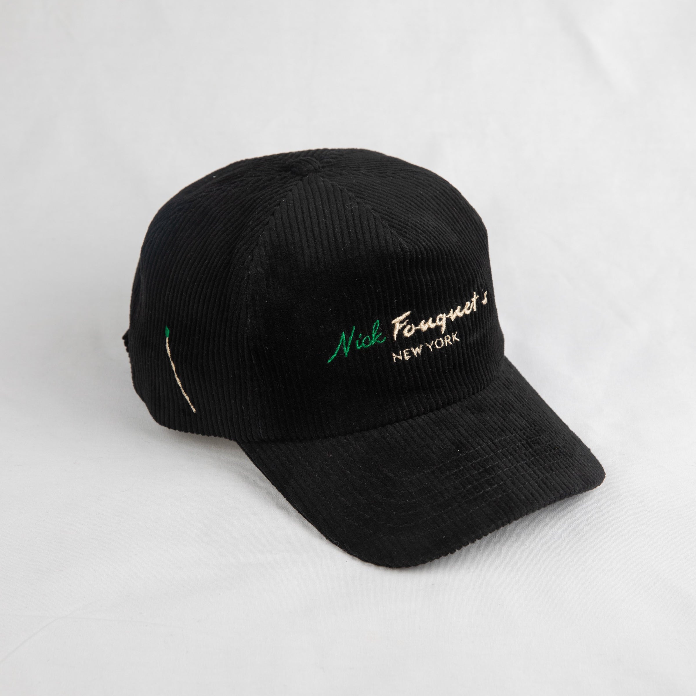 Black cap with text on a white background